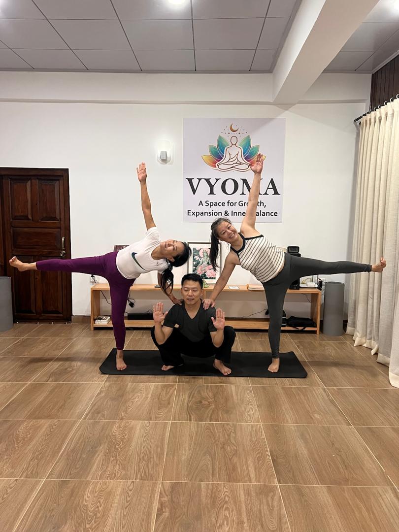 Teaching moment at Vyoma Yoga